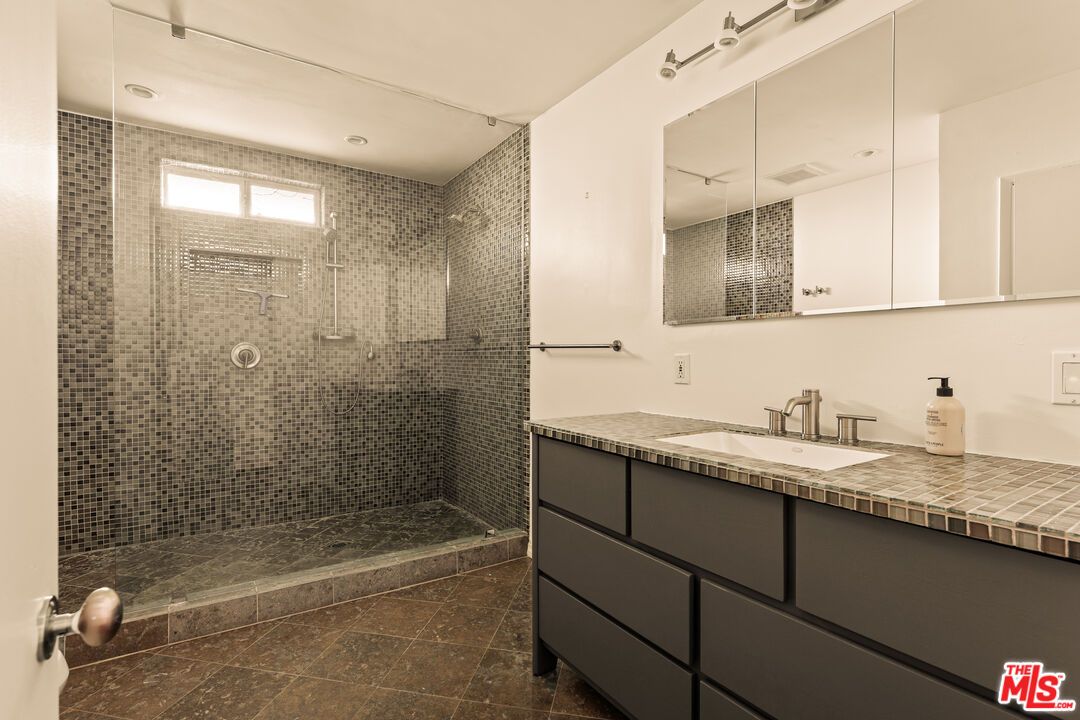 Bathroom, Dual Sink Vanities, Glass Shower, Interior, Recessed Lighting, Tile Countertops