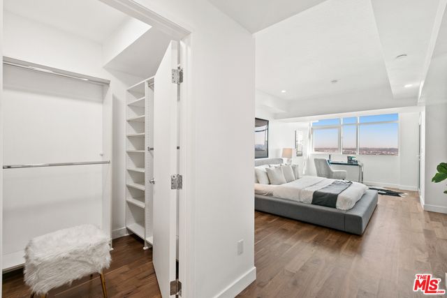 Bedroom, Interior, Recessed Lighting, Walk-in Closets, Wood Texture Flooring