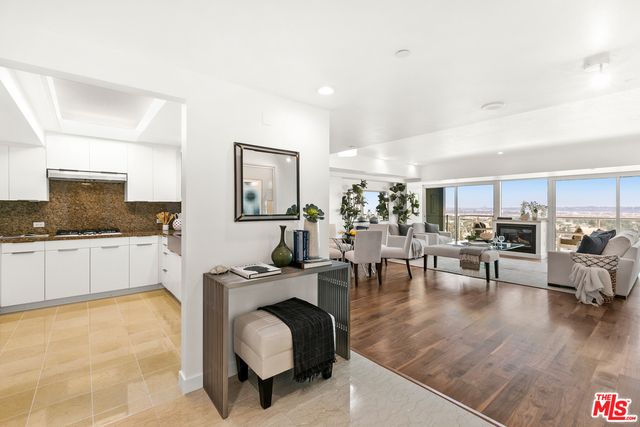 Dining room, Fireplace, Interior, Kitchen, Living room, Recessed Lighting, Wood Texture Flooring