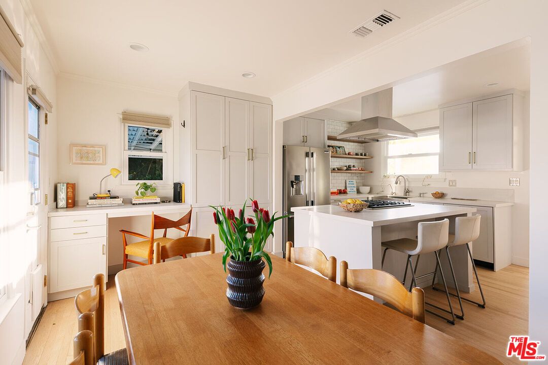 Dining room, Interior, Kitchen, Recessed Lighting, Stainless Steel Appliances, Wood Texture Flooring