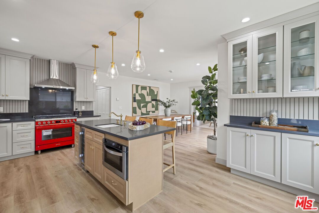 Dining room, Interior, Kitchen, Pendant Lights, Recessed Lighting, Stainless Steel Appliances, Wood Texture Flooring