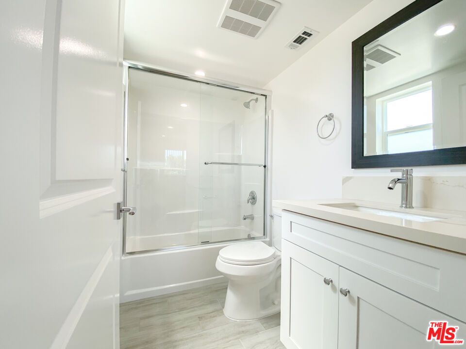 Bathroom, Glass Shower, Interior, Recessed Lighting, Wood Texture Flooring