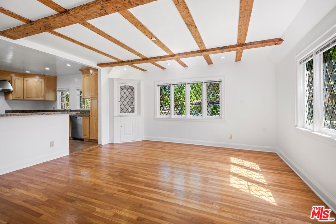 Empty room, Interior, Kitchen, Recessed Lighting, Stainless Steel Appliances, Wooden Beams, Wood Texture Flooring