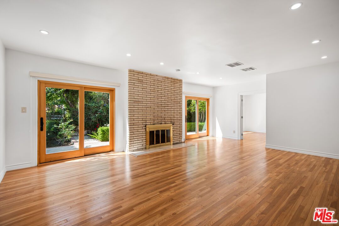 Empty room, Fireplace, Interior, Recessed Lighting, Wood Texture Flooring