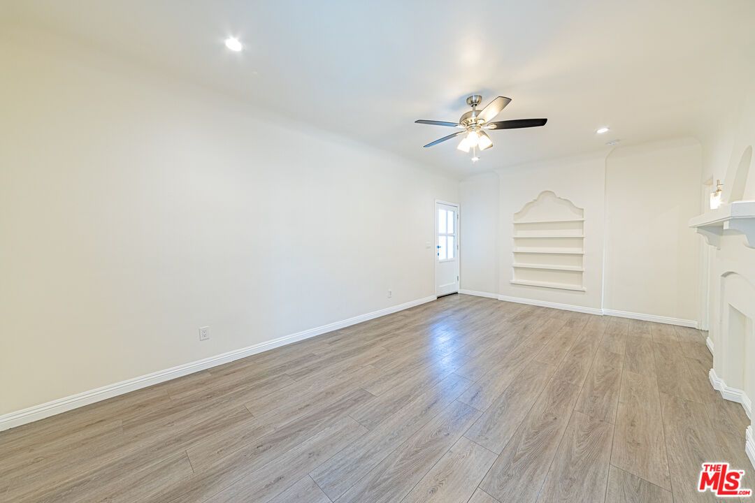 Empty room, Fireplace, Interior, Recessed Lighting, Wood Texture Flooring