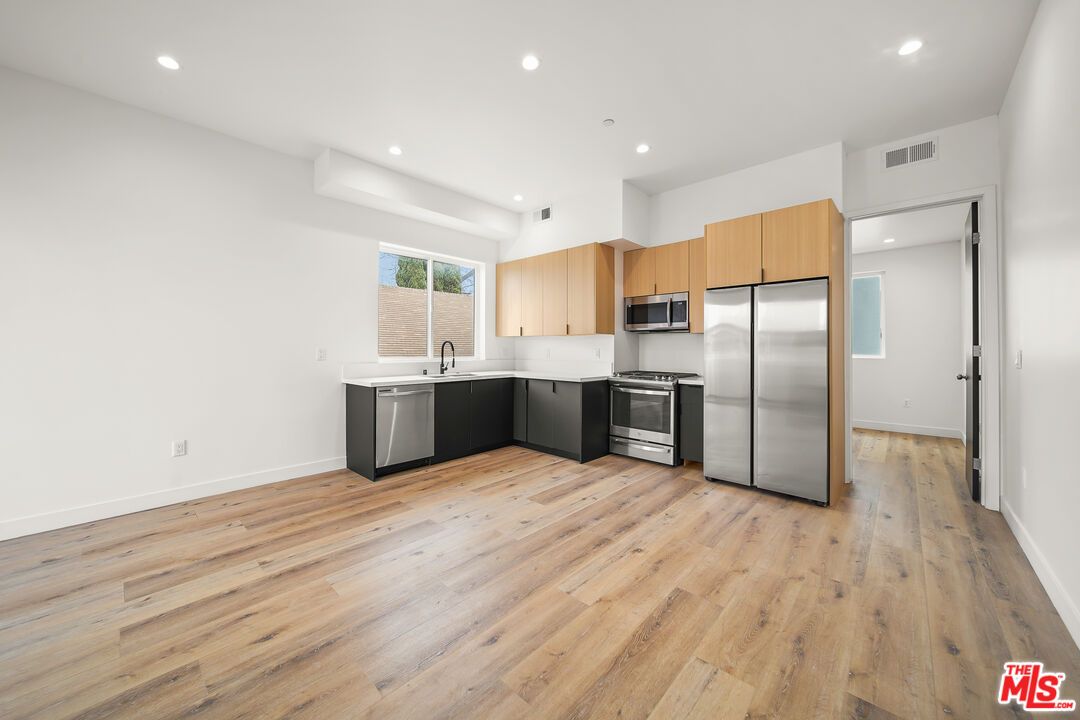 Interior, Kitchen, Recessed Lighting, Stainless Steel Appliances, Wood Texture Flooring