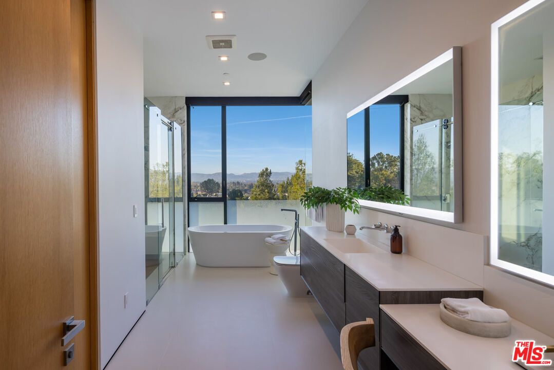 Bathroom, Dual Sink Vanities, Free Standing Baths, Interior, Marble Walls, Recessed Lighting