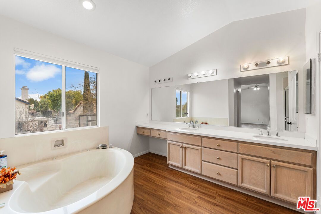 Bathroom, Dual Sink Vanities, Free Standing Baths, Interior, Recessed Lighting, Wood Texture Flooring