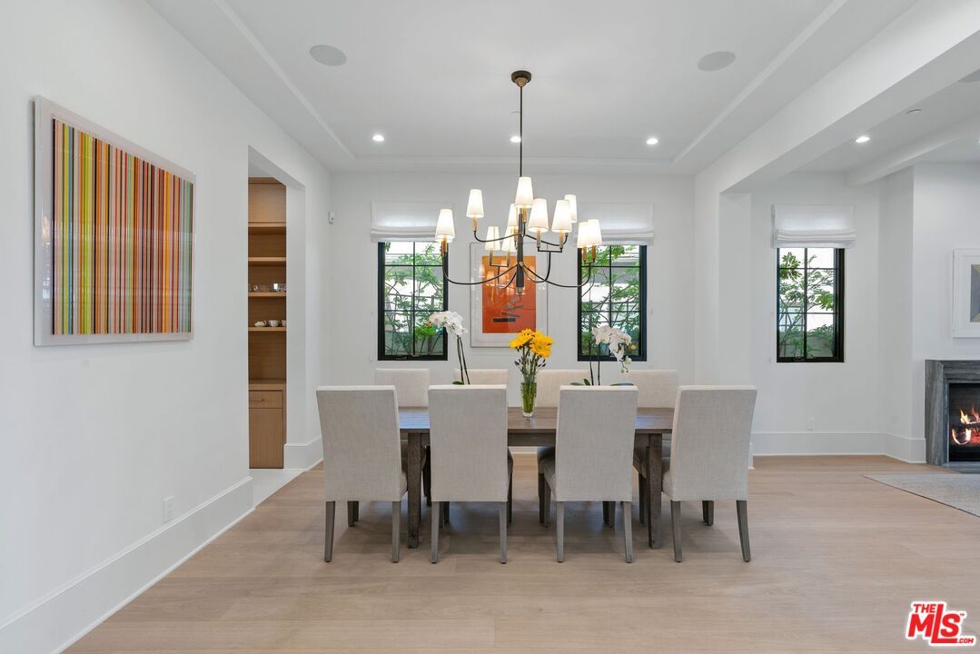 Chandelier, Dining room, Fireplace, Interior, Recessed Lighting, Wood Texture Flooring