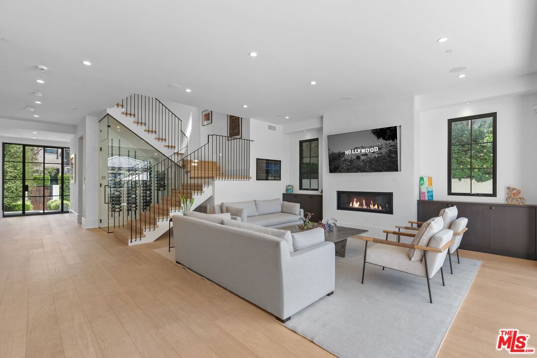 Fireplace, Interior, Living room, Recessed Lighting, Wood Texture Flooring