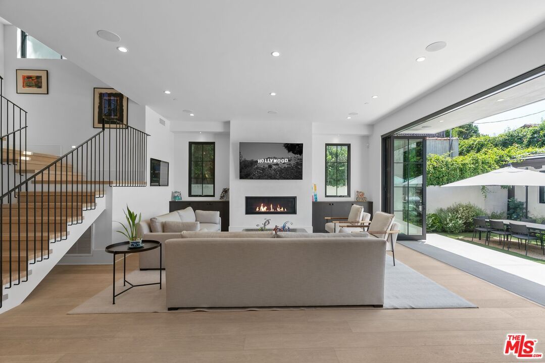 Fireplace, Interior, Living room, Recessed Lighting, Wood Texture Flooring