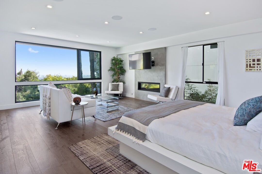 Bedroom, Fireplace, Interior, Recessed Lighting, Wood Texture Flooring