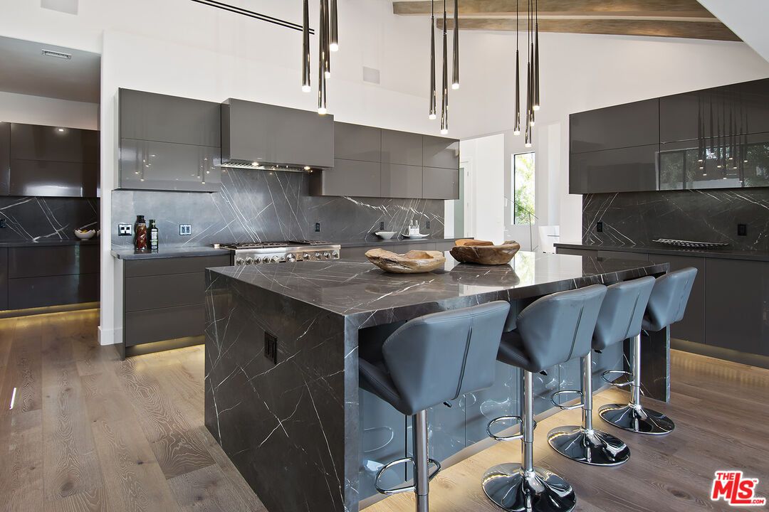 Interior, Kitchen, Marble Walls, Pendant Lights, Recessed Lighting, Stainless Steel Appliances, Wood Texture Flooring