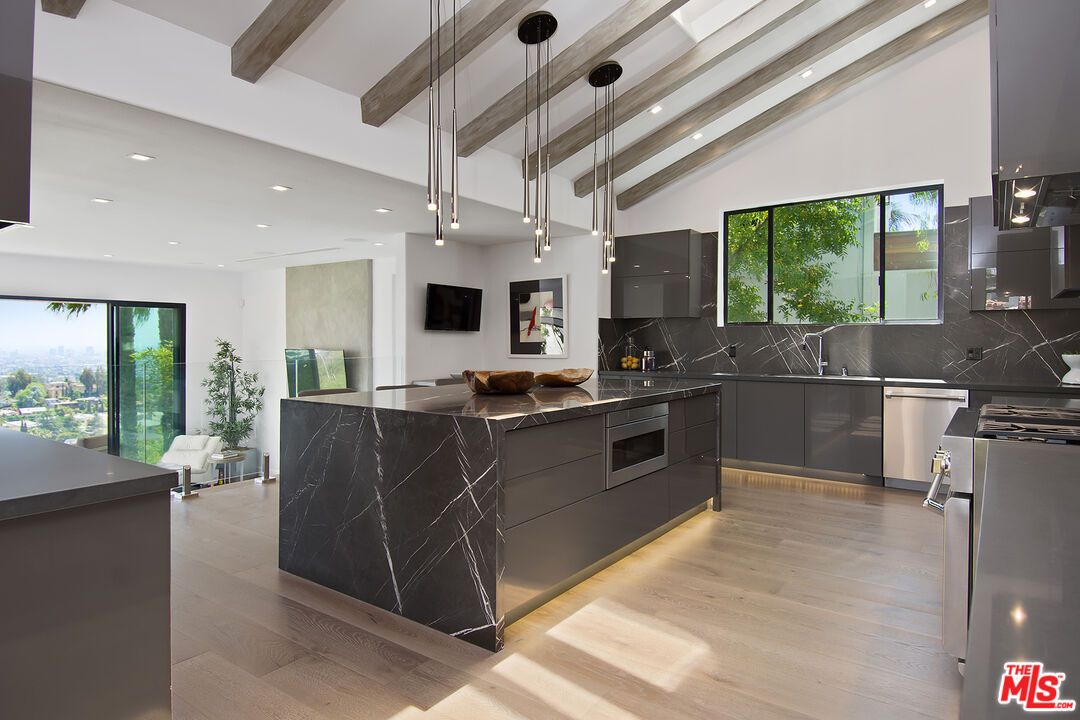 Interior, Kitchen, Marble Walls, Pendant Lights, Recessed Lighting, Stainless Steel Appliances, Wooden Beams, Wood Texture Flooring