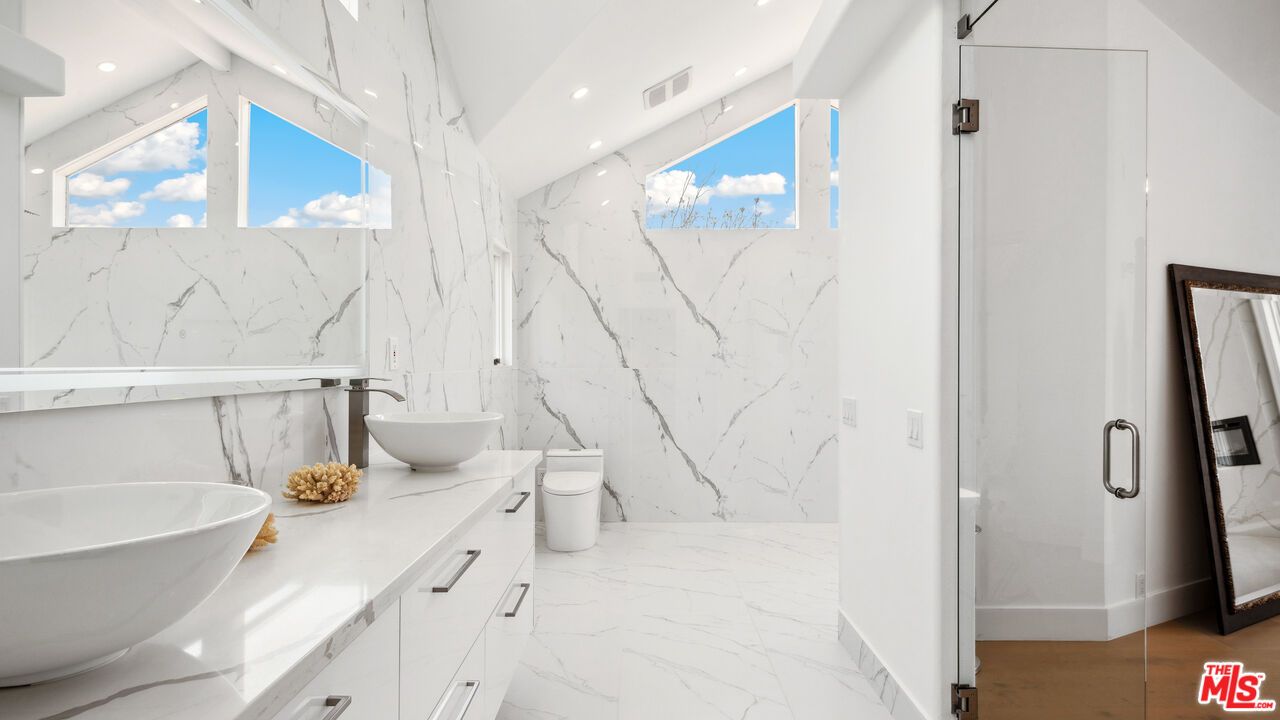 Bathroom, Dual Sink Vanities, Glass Shower, Interior, Marble, Marble Walls, Recessed Lighting