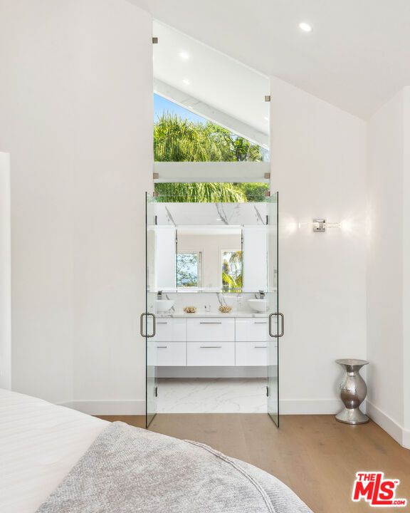 Bathroom, Bedroom, Glass Shower, Interior, Marble, Marble Walls, Recessed Lighting, Wood Texture Flooring