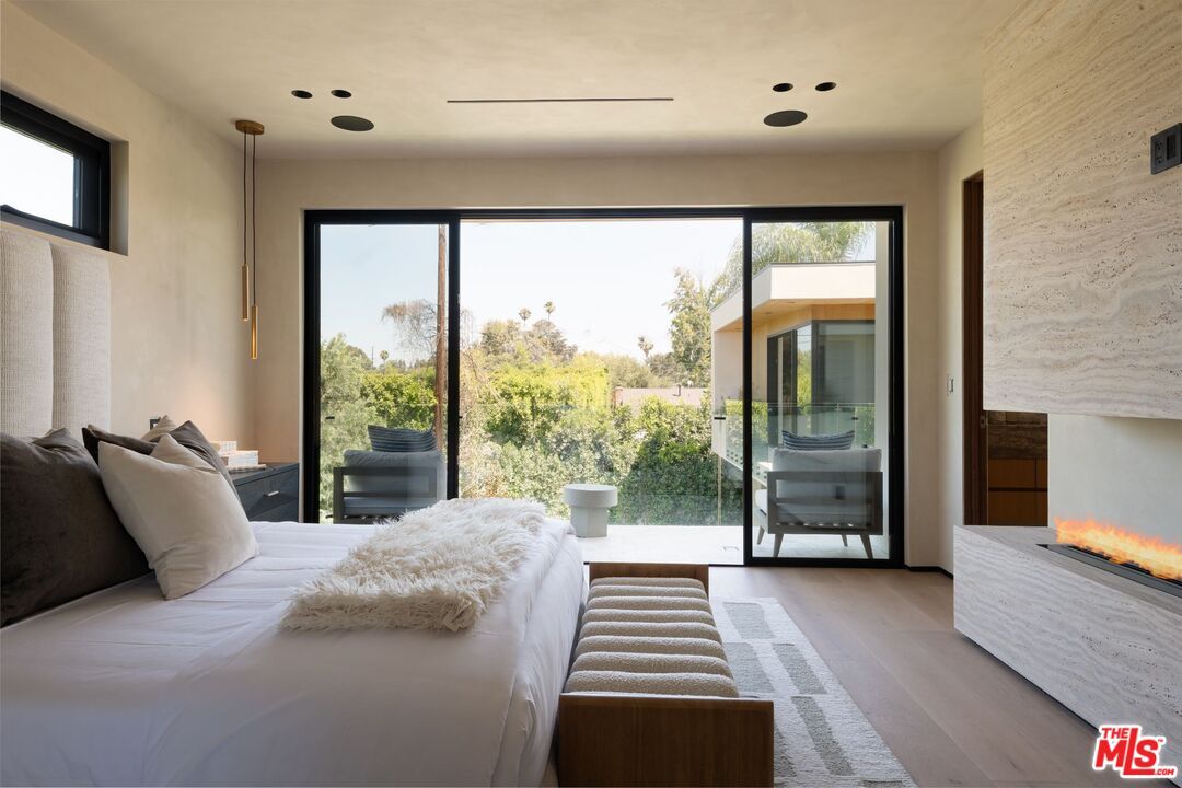 Bedroom, Fireplace, Interior, Pendant Lights, Recessed Lighting, Wood Texture Flooring