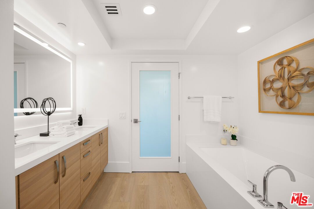 Bathroom, Dual Sink Vanities, Interior, Recessed Lighting, Wood Texture Flooring