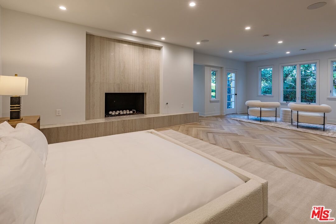 Bedroom, Fireplace, Interior, Recessed Lighting, Wood Texture Flooring