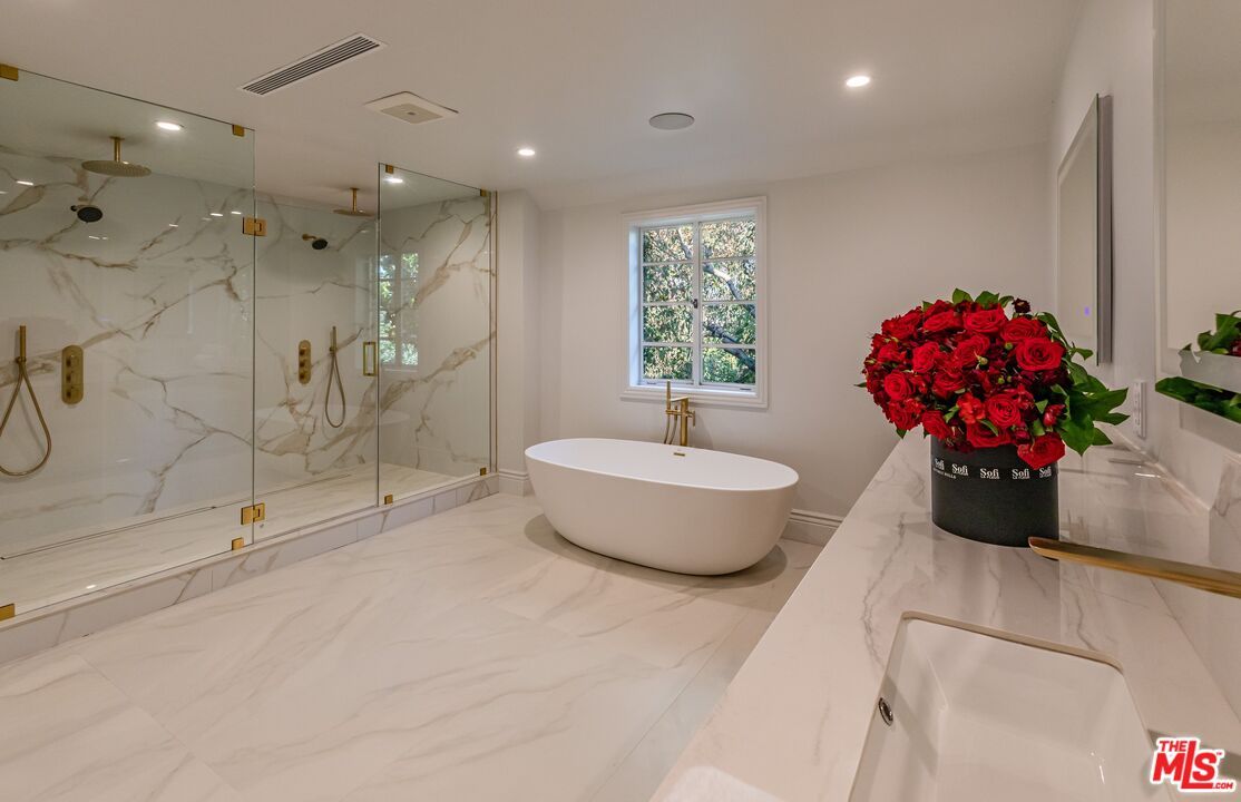 Bathroom, Free Standing Baths, Glass Shower, Interior, Marble, Marble Walls, Recessed Lighting