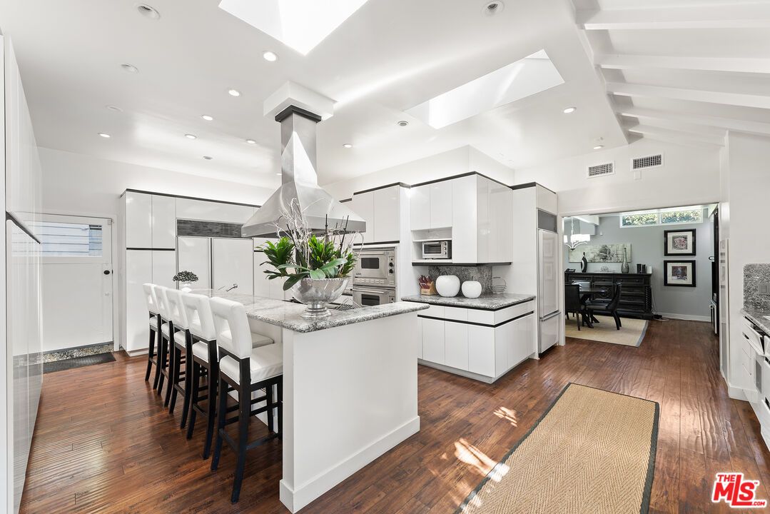 Dining room, Interior, Kitchen, Recessed Lighting, Stainless Steel Appliances, Wood Texture Flooring