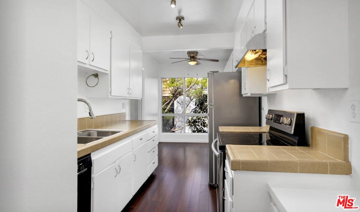 Interior, Kitchen, Tile Countertops, Wood Texture Flooring