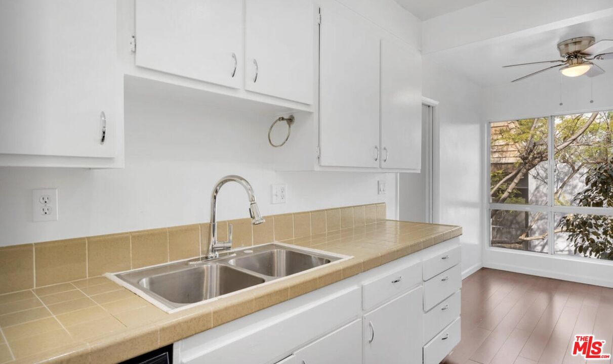 Interior, Kitchen, Tile Countertops, Wood Texture Flooring