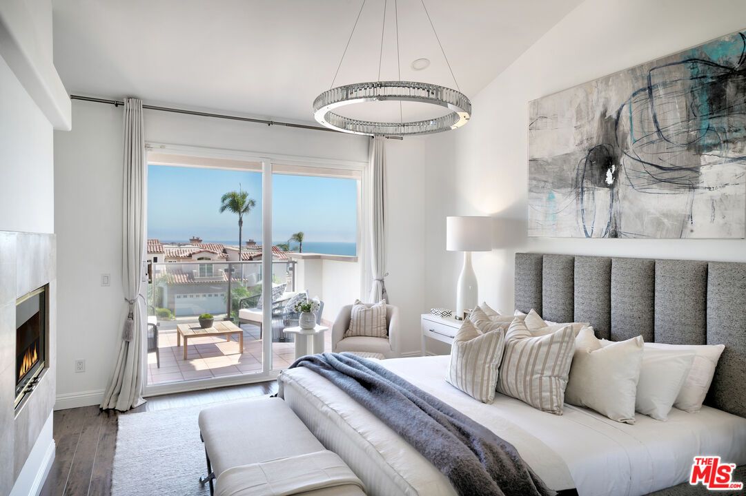 Bedroom, Fireplace, Interior, Pendant Lights, Water, Wood Texture Flooring