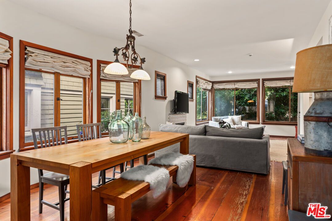 Dining room, Fireplace, Interior, Living room, Pendant Lights, Recessed Lighting, Wood Texture Flooring