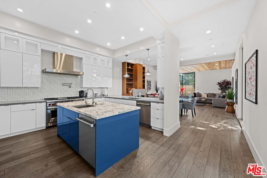 Dining room, Interior, Kitchen, Living room, Pendant Lights, Recessed Lighting, Stainless Steel Appliances, Wood Texture Flooring