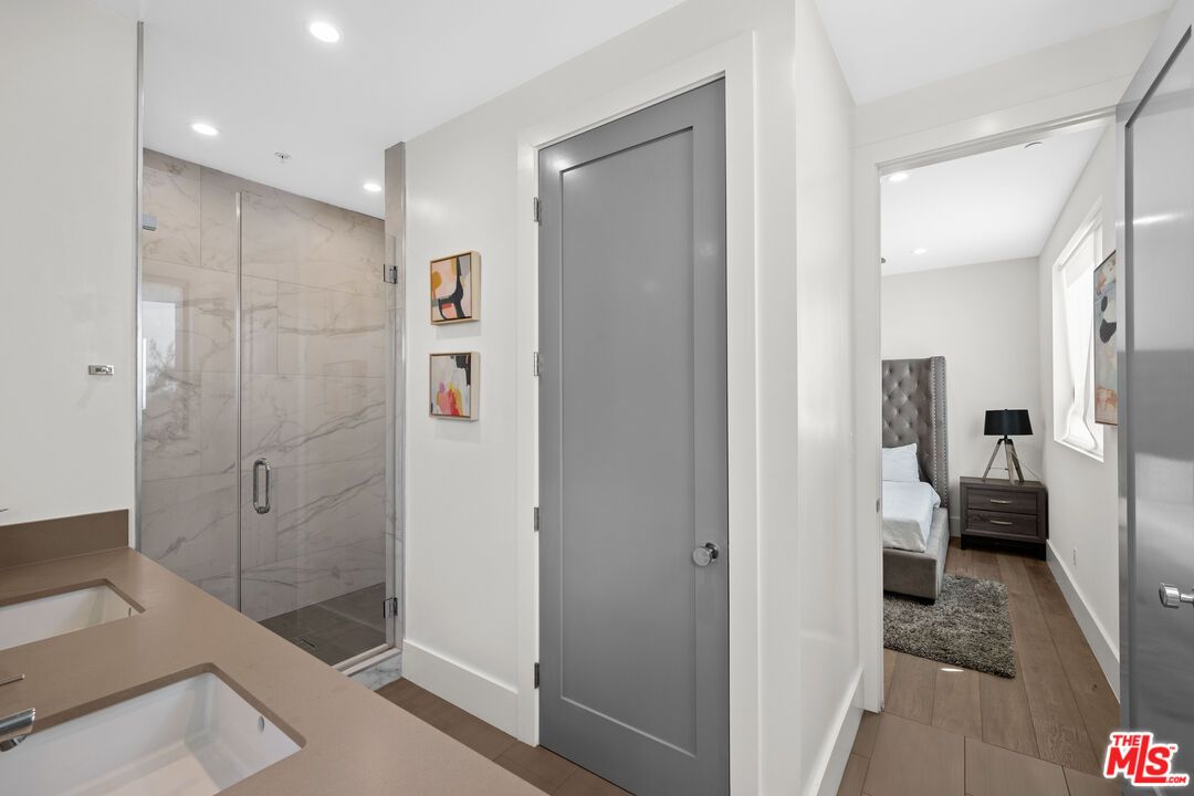 Bathroom, Bedroom, Glass Shower, Interior, Marble Walls, Recessed Lighting, Wood Texture Flooring