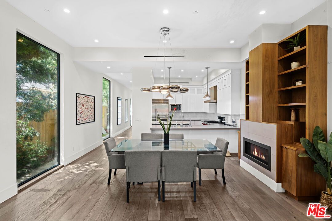 Dining room, Fireplace, Interior, Kitchen, Pendant Lights, Recessed Lighting, Wood Texture Flooring