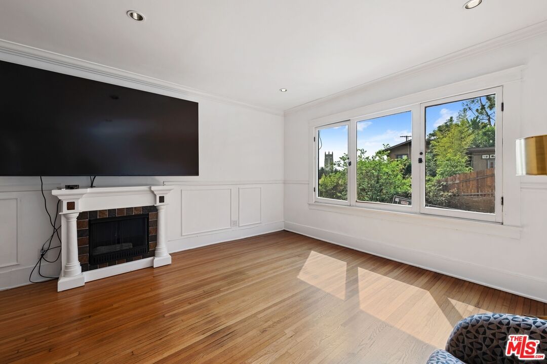 Empty room, Fireplace, Interior, Recessed Lighting, Wood Texture Flooring