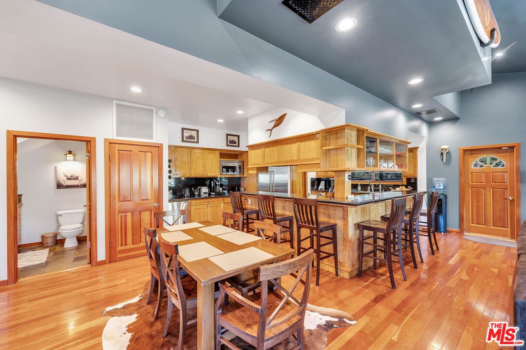 Dining room, Interior, Kitchen, Recessed Lighting, Stainless Steel Appliances, Wood Texture Flooring