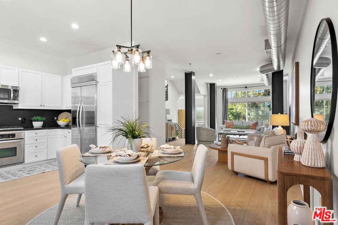 Dining room, Interior, Kitchen, Living room, Pendant Lights, Recessed Lighting, Stainless Steel Appliances, Wood Texture Flooring