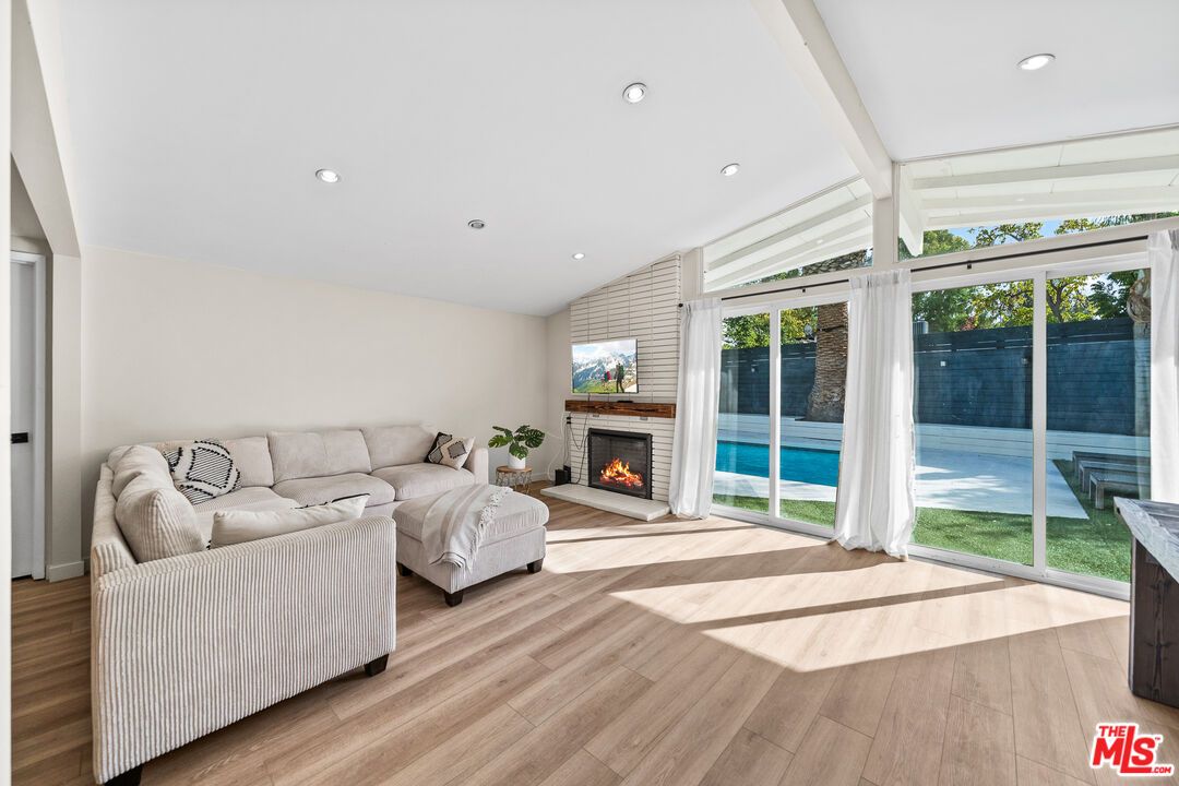 Fireplace, Interior, Living room, Recessed Lighting, Wood Texture Flooring