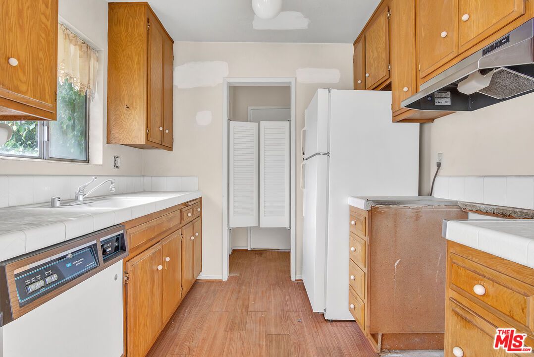 Interior, Kitchen, Tile Countertops, Wood Texture Flooring