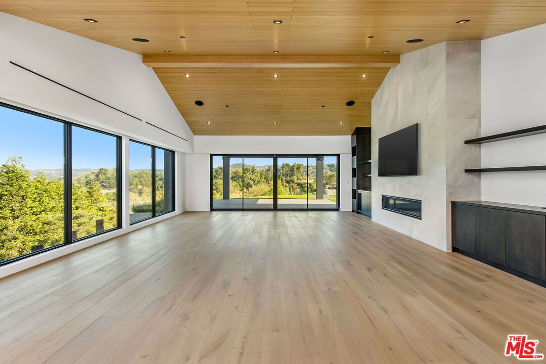 Empty room, Fireplace, Interior, Recessed Lighting, Wooden Ceilings, Wood Texture Flooring