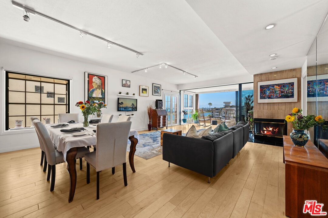 Dining room, Fireplace, Interior, Living room, Recessed Lighting, Wood Texture Flooring, Wooden Walls