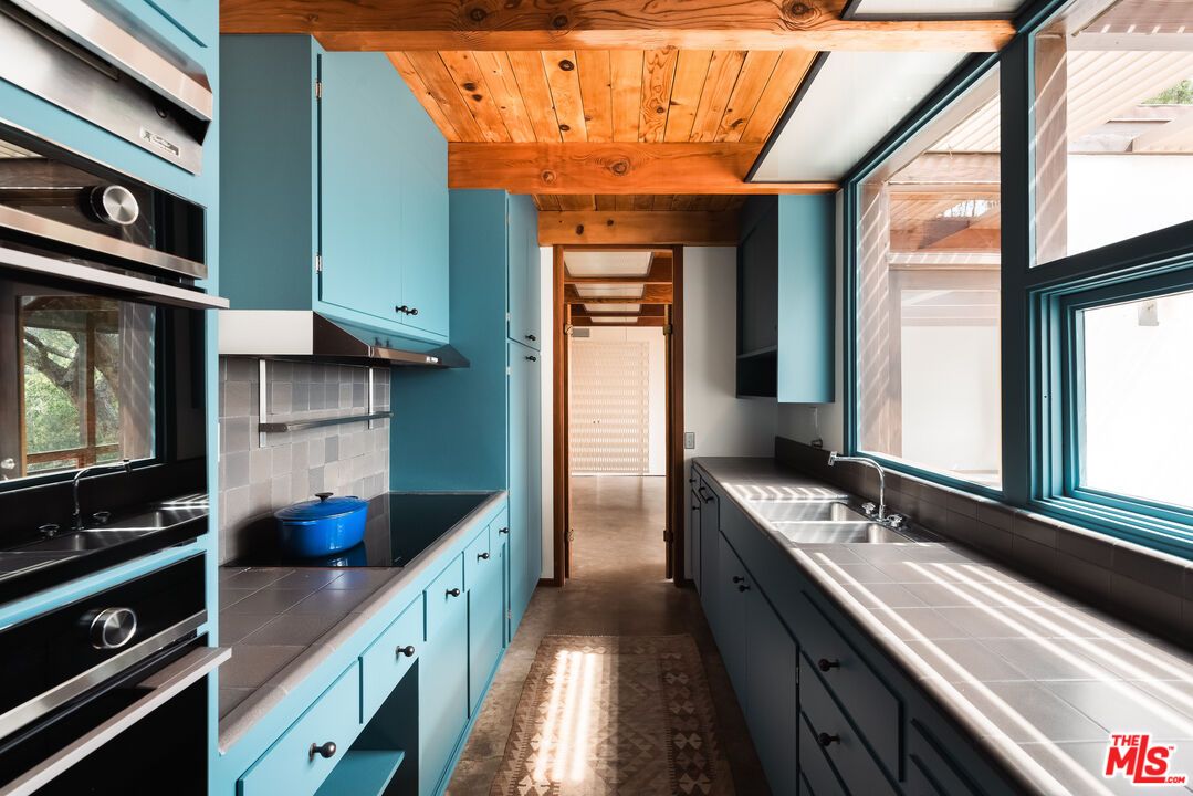 Interior, Kitchen, Stainless Steel Appliances, Tile Countertops, Wooden Ceilings