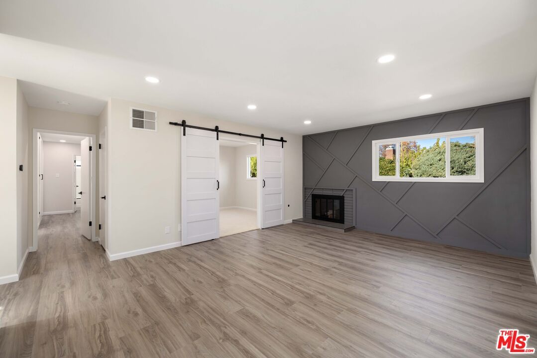Empty room, Fireplace, Interior, Recessed Lighting, Wood Texture Flooring