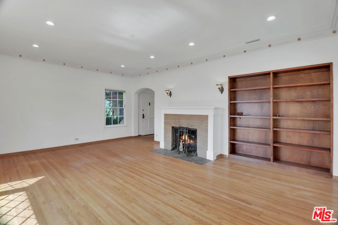 Empty room, Fireplace, Interior, Recessed Lighting, Wood Texture Flooring