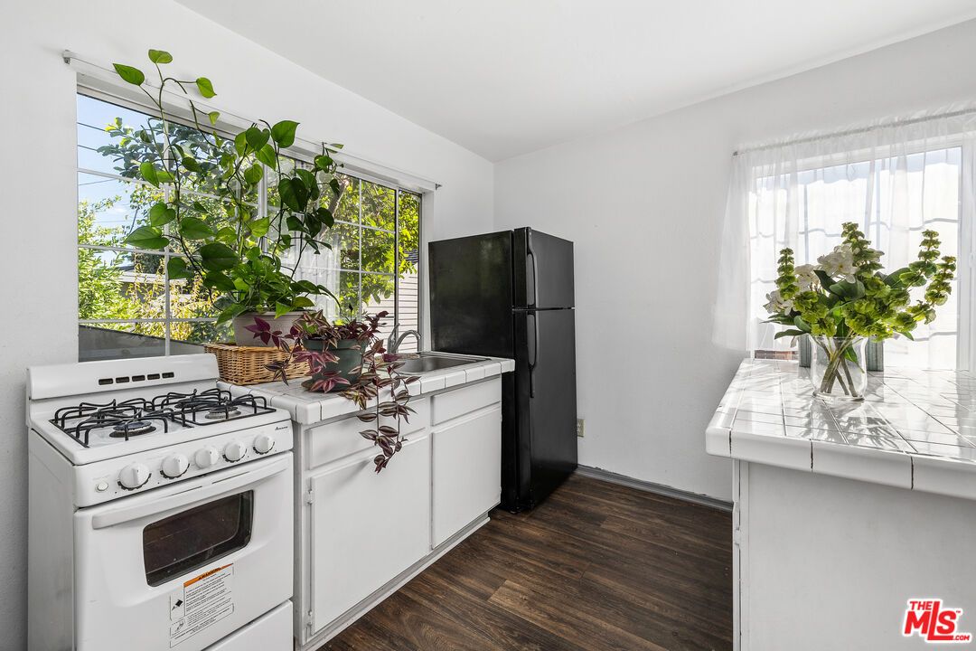 Interior, Kitchen, Tile Countertops, Wood Texture Flooring