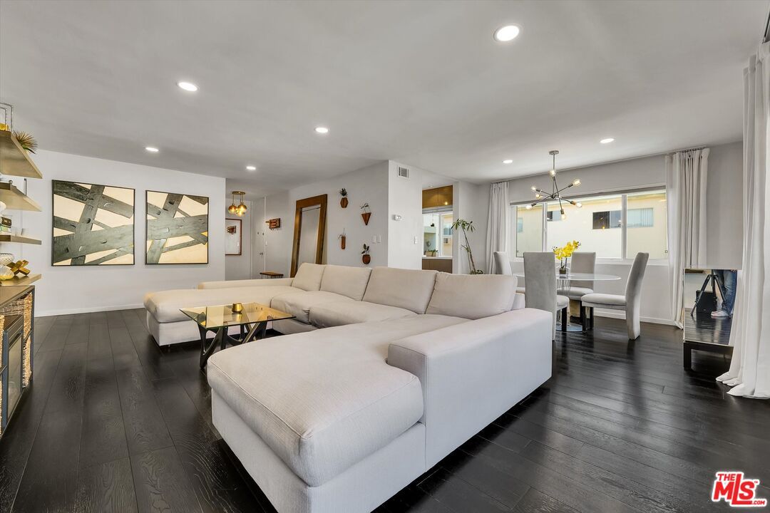 Dining room, Fireplace, Interior, Living room, Pendant Lights, Recessed Lighting, Wood Texture Flooring