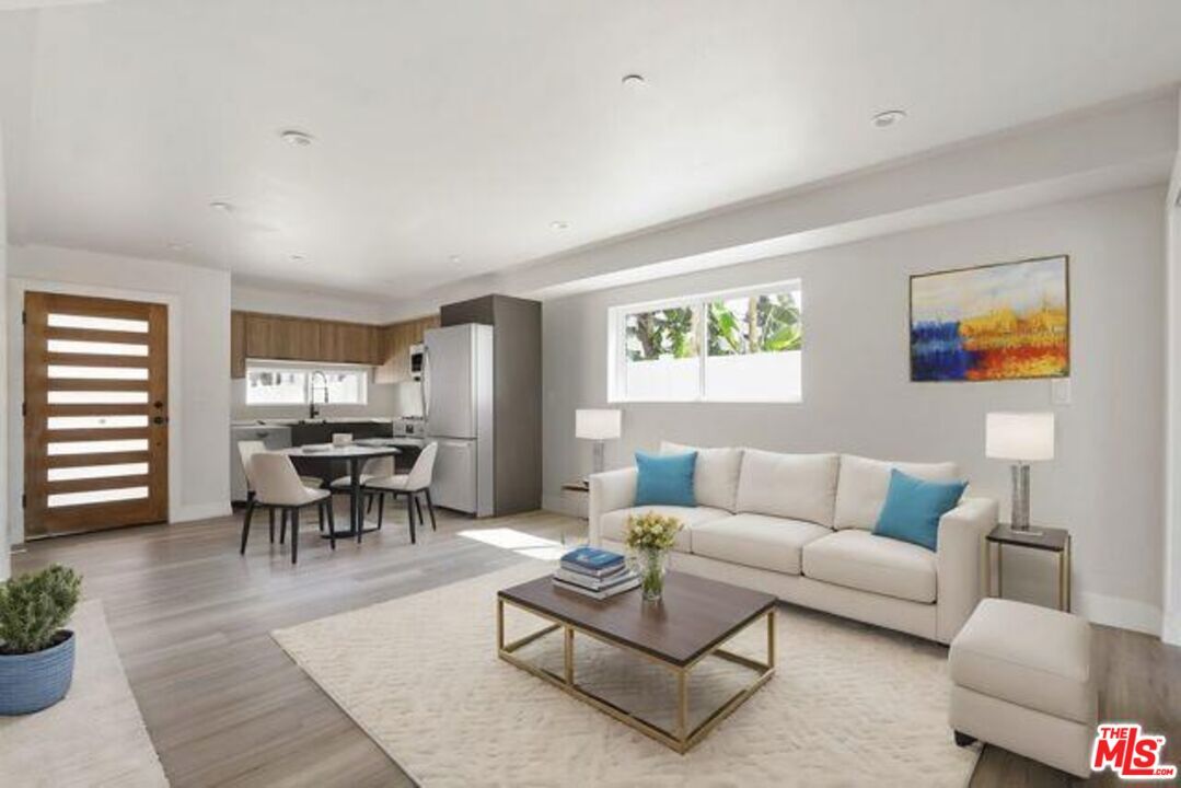 Dining room, Interior, Kitchen, Living room, Recessed Lighting, Stainless Steel Appliances, Wood Texture Flooring