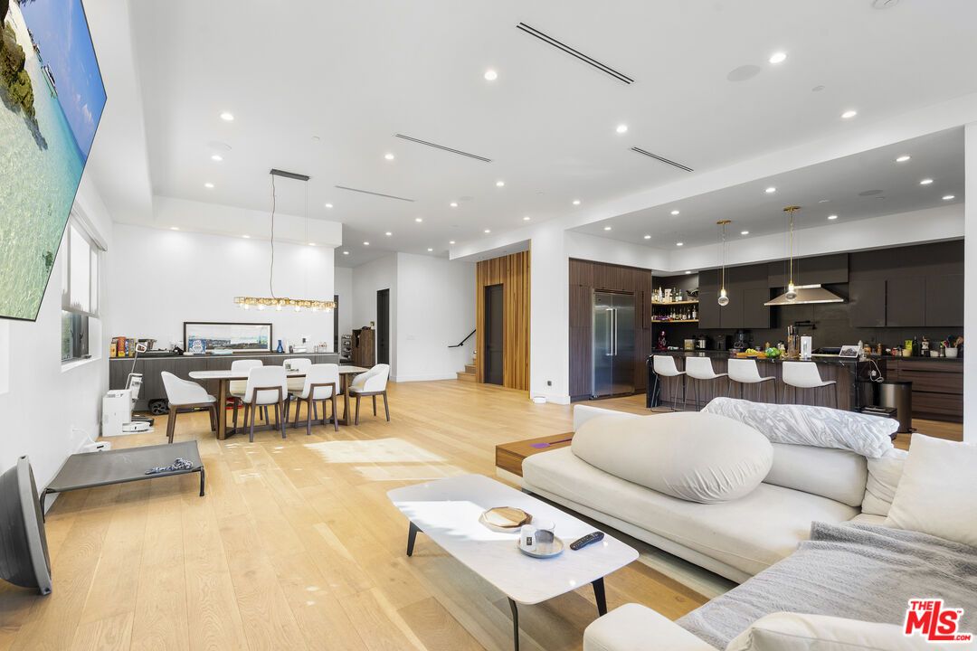 Dining room, Interior, Kitchen, Living room, Pendant Lights, Recessed Lighting, Stainless Steel Appliances, Wood Texture Flooring