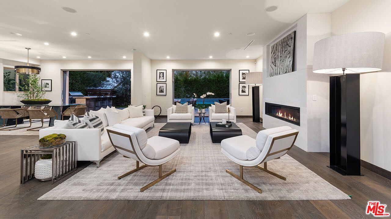 Dining room, Fireplace, Interior, Living room, Pendant Lights, Recessed Lighting, Wood Texture Flooring