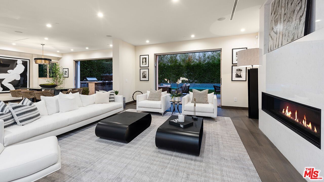 Dining room, Fireplace, Interior, Living room, Pendant Lights, Recessed Lighting, Wood Texture Flooring