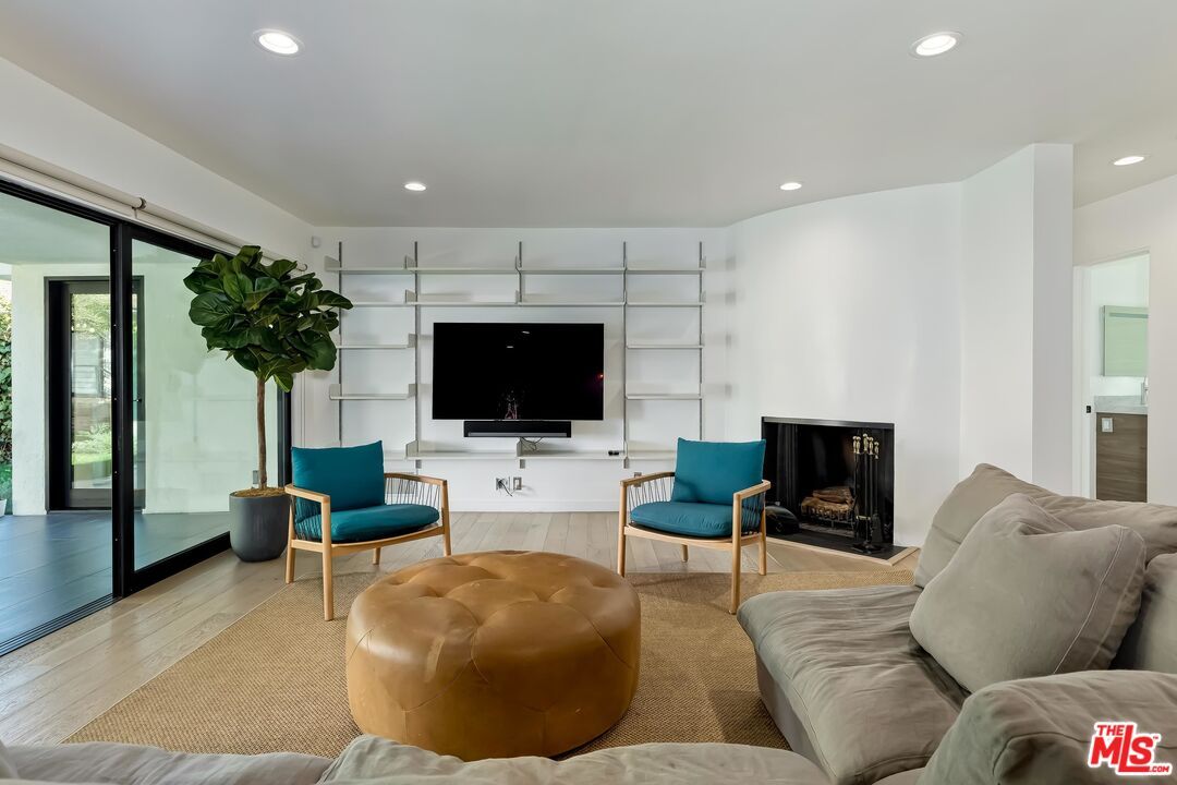 Fireplace, Interior, Living room, Recessed Lighting, Wood Texture Flooring