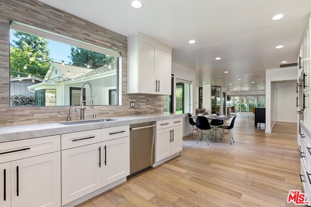 Dining room, Interior, Kitchen, Recessed Lighting, Stainless Steel Appliances, Wood Texture Flooring